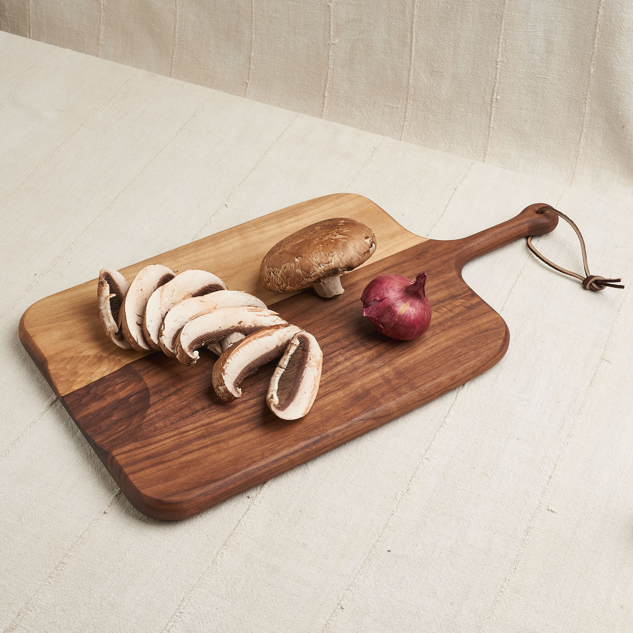 http://housework.store/cdn/shop/products/de-jong-cutting-board-serving-board-natural-walnut-1.jpg?v=1638509594