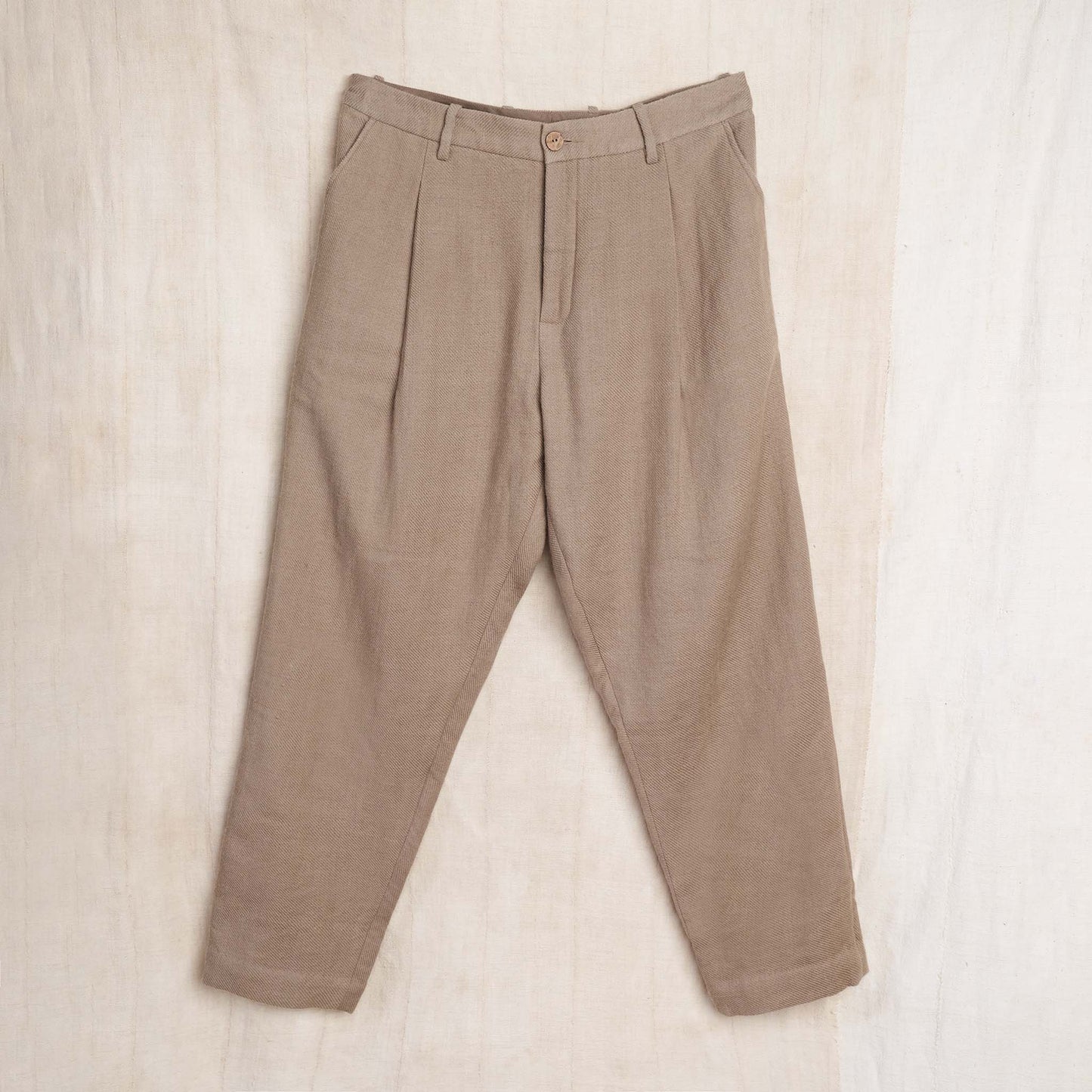 11.11 / eleven eleven | Pleated Taper Trousers in Iron Gray Wool Twill ...